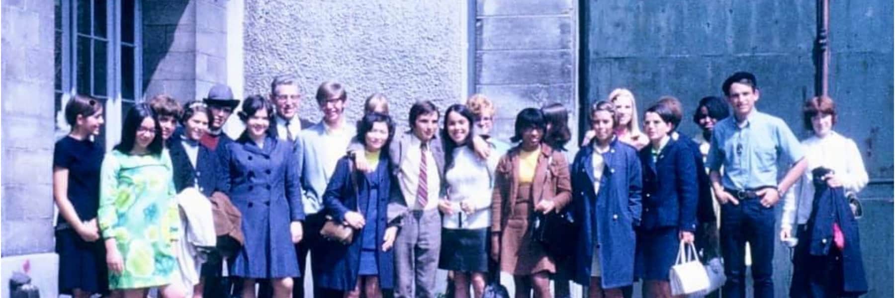 Students pose in 1968 in front of a wall