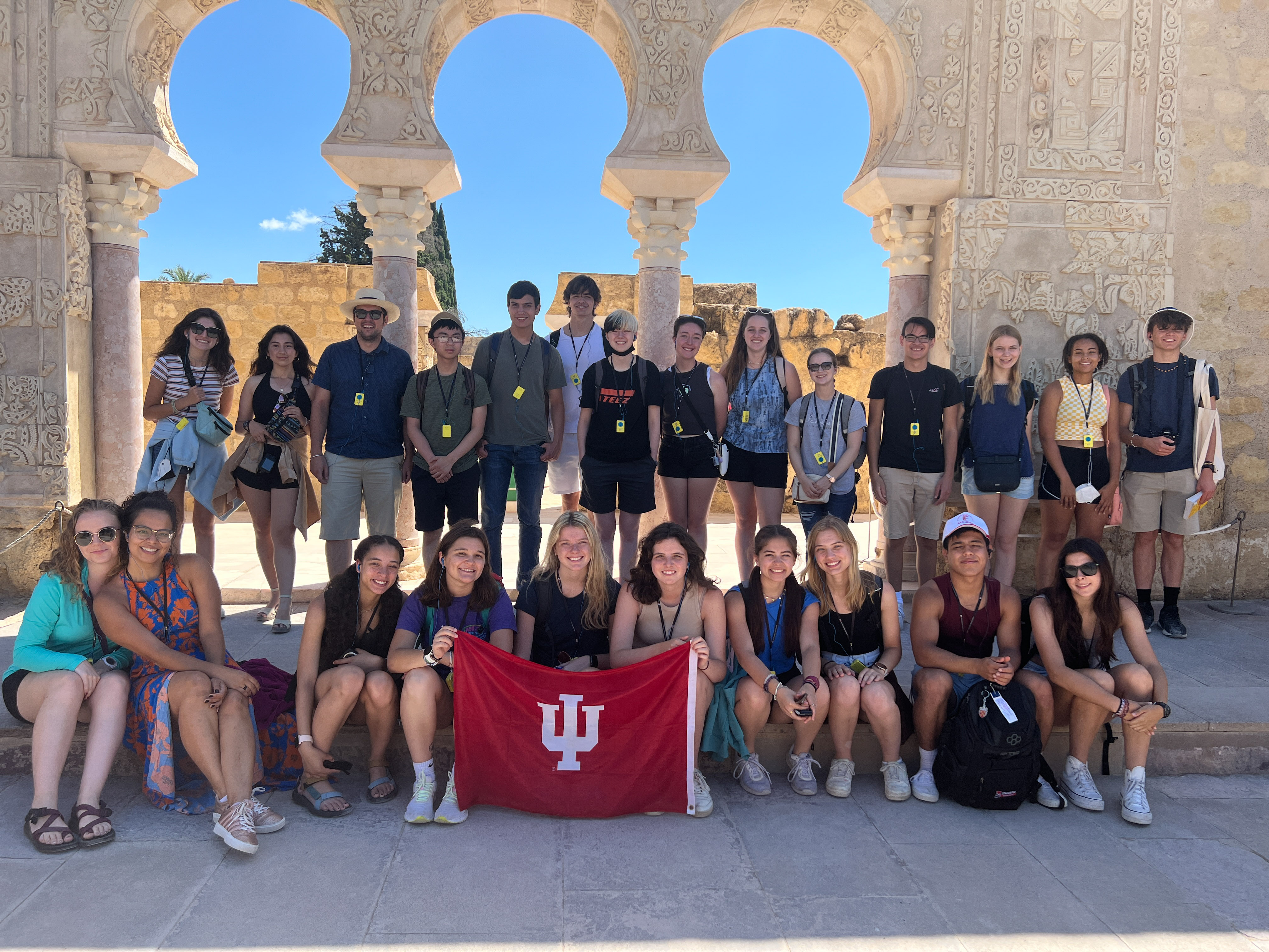 Group poses with IU flag in Cordoba