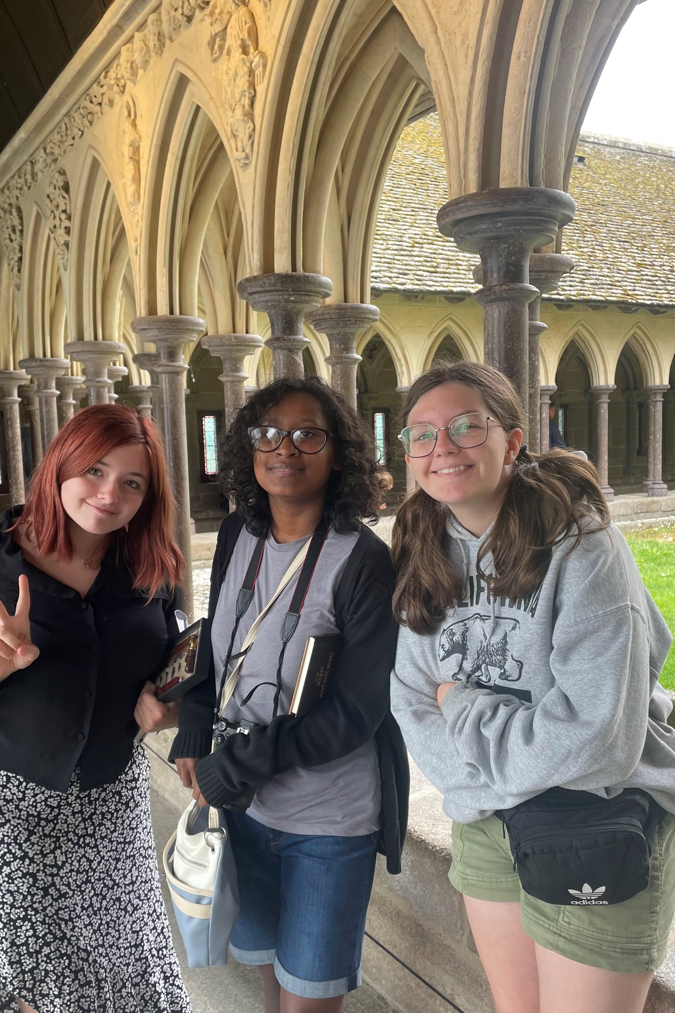 Three students pose for a picture in St Brieuc